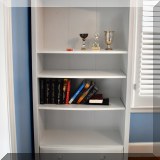 F43. White bookcase. 71”h x 34”w x 13”d 